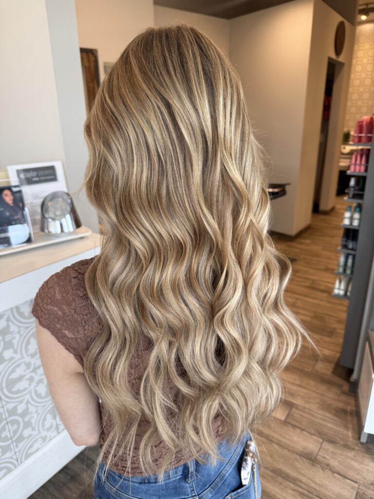 Long blonde waves at Taylor Stevens Salon
