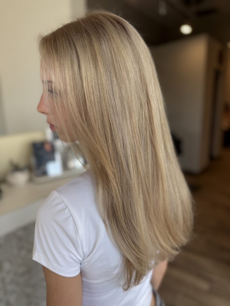 Smooth straight blonde hair at Taylor Stevens Salon