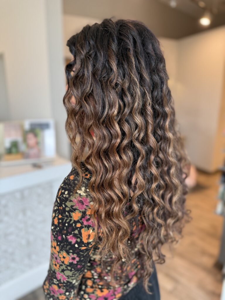 Defined brunette curls at Taylor Stevens Salon